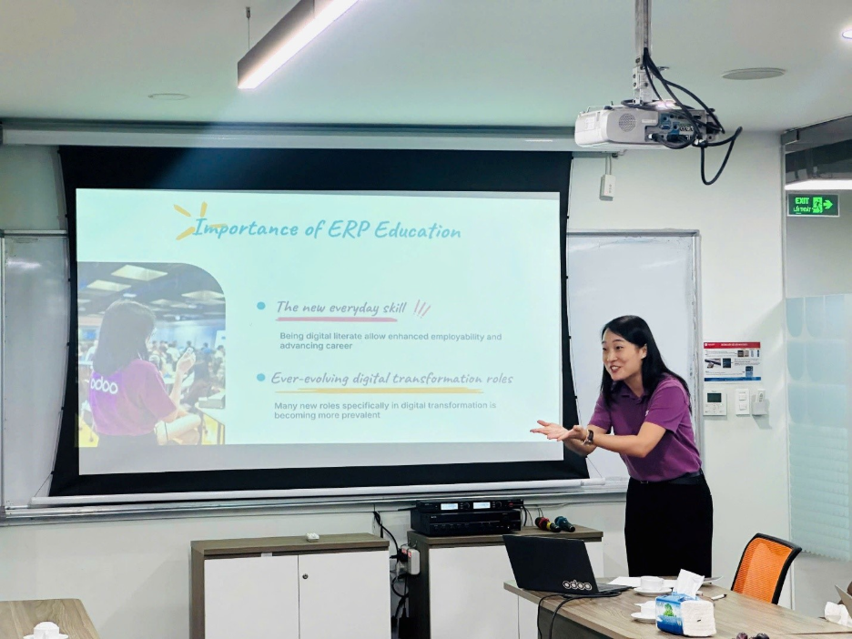 A person standing in front of a projector screen

AI-generated content may be incorrect.
