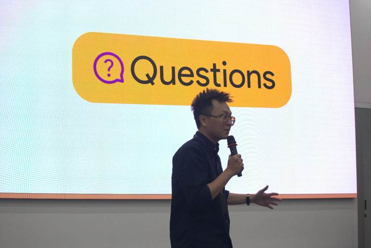 A person standing in front of a large screen
AI-generated content may be incorrect.