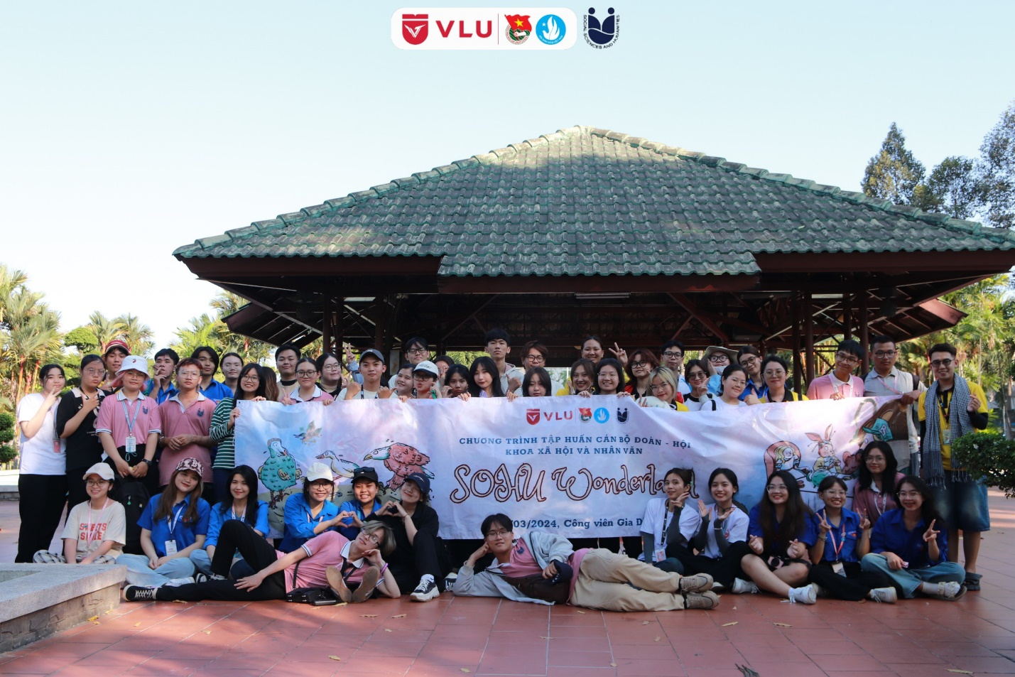 A group of people posing for a photo

Description automatically generated