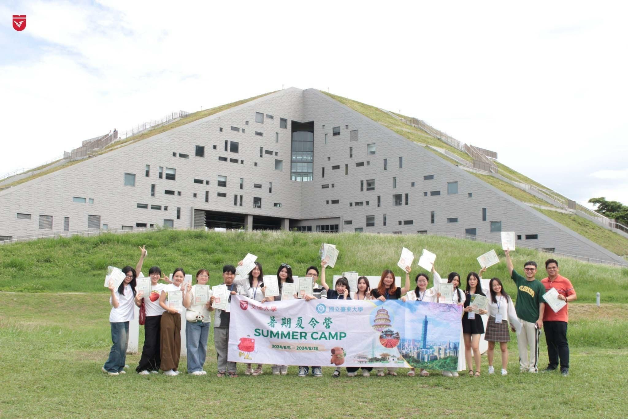 A group of people holding a banner
AI-generated content may be incorrect.