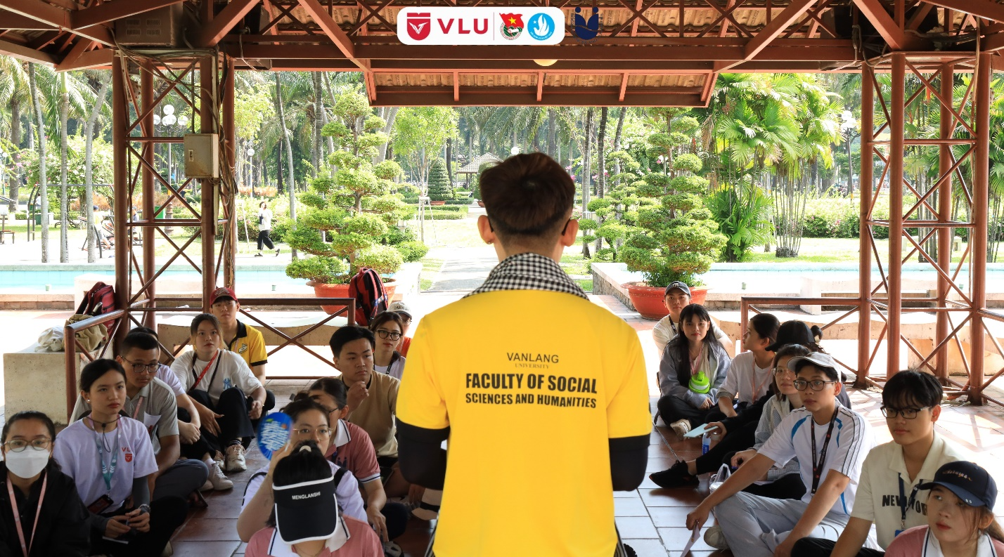 A person in a yellow shirt

Description automatically generated